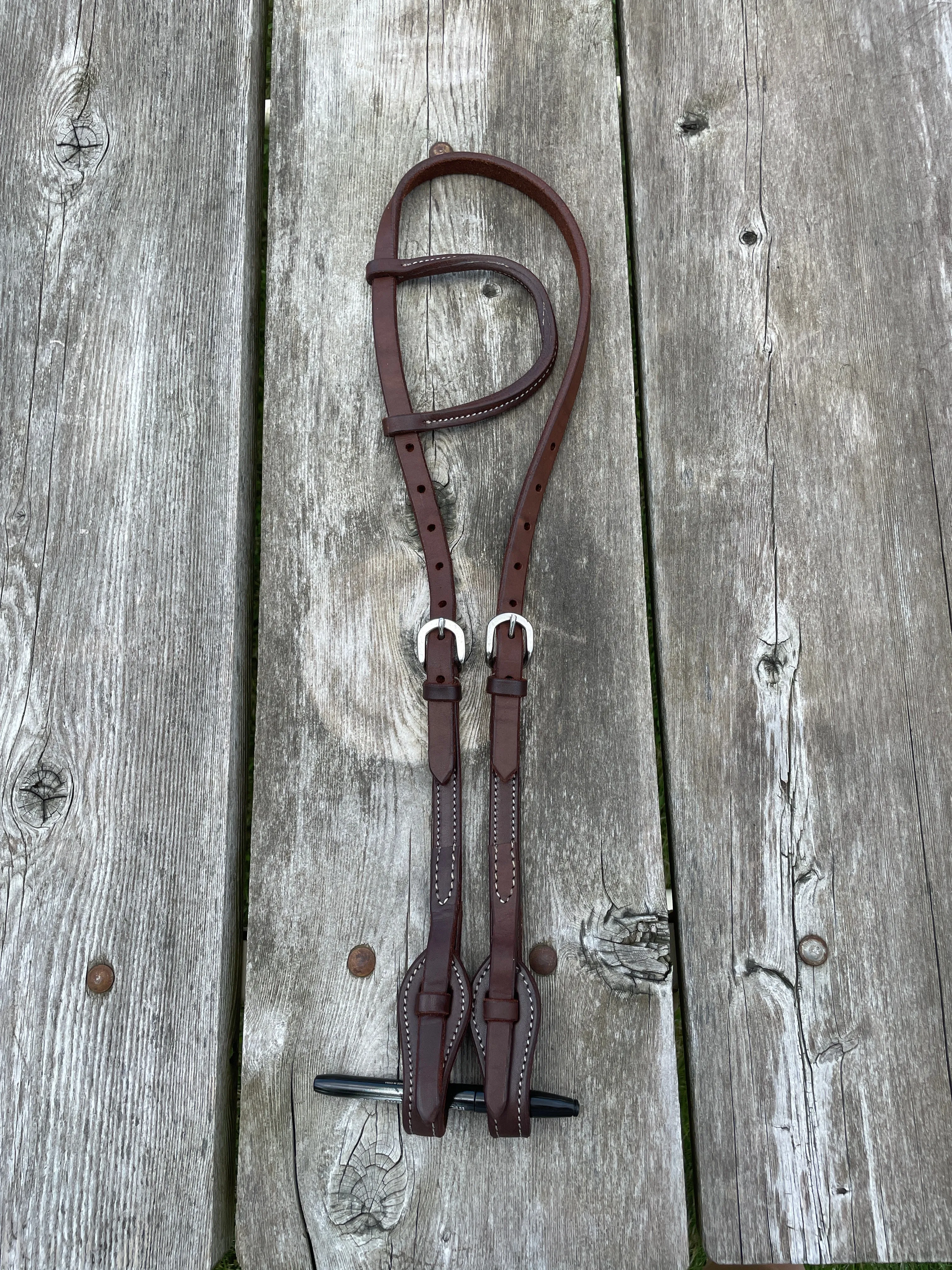 Oiled leather one ear headstall with quick change bit loops